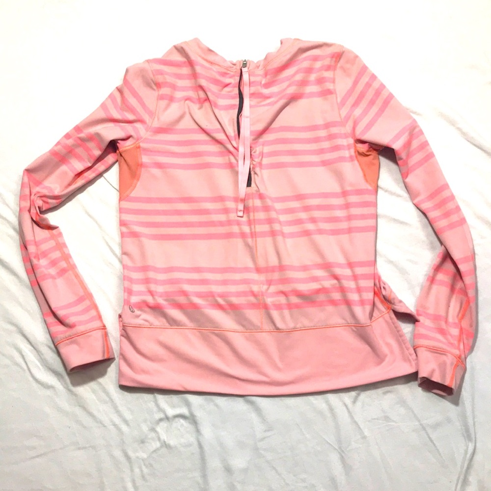 Lululemon women’s long sleeve top. Electric salmon color. Size small.
